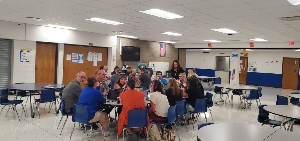 6-8 staff working on standards at Adams Middle School.