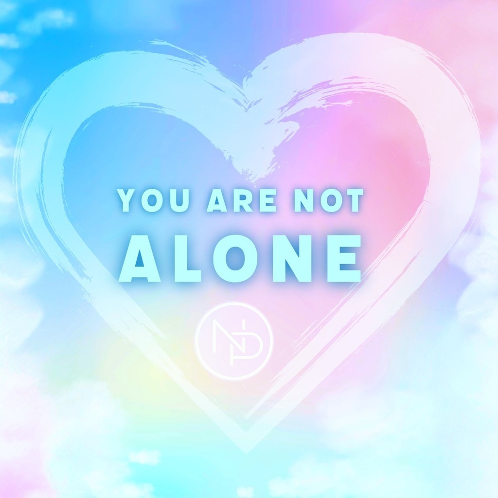 Heart that says you are not alone with the NP logo.