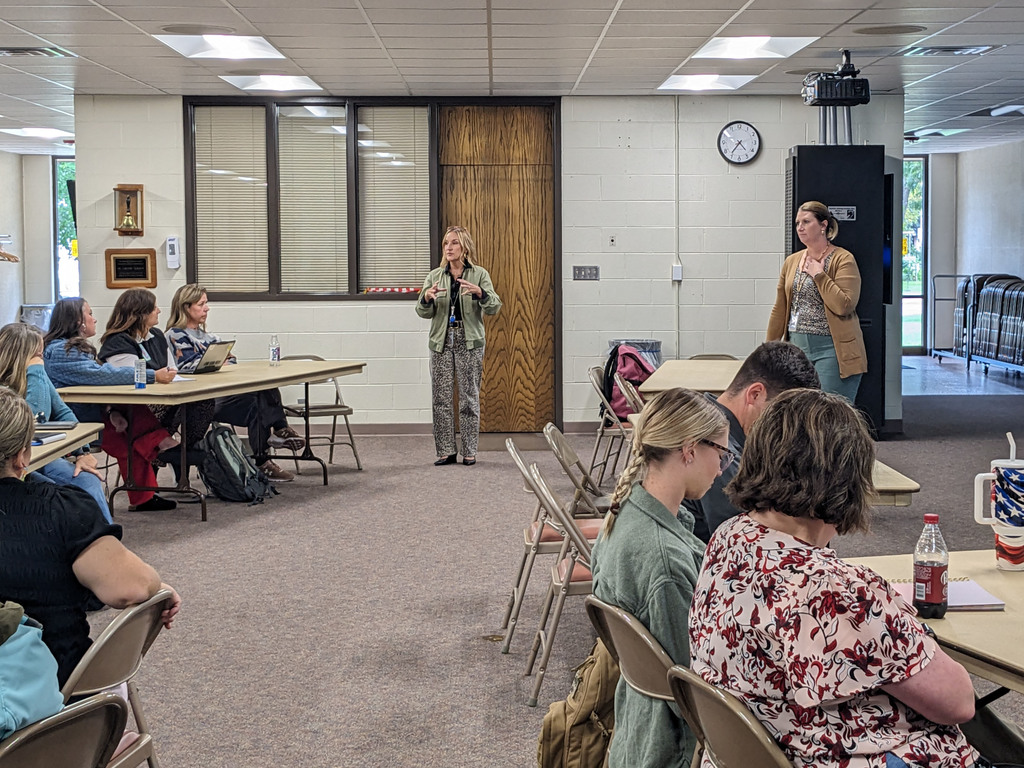 Teaching and Learning presenting to District Guiding Coalition