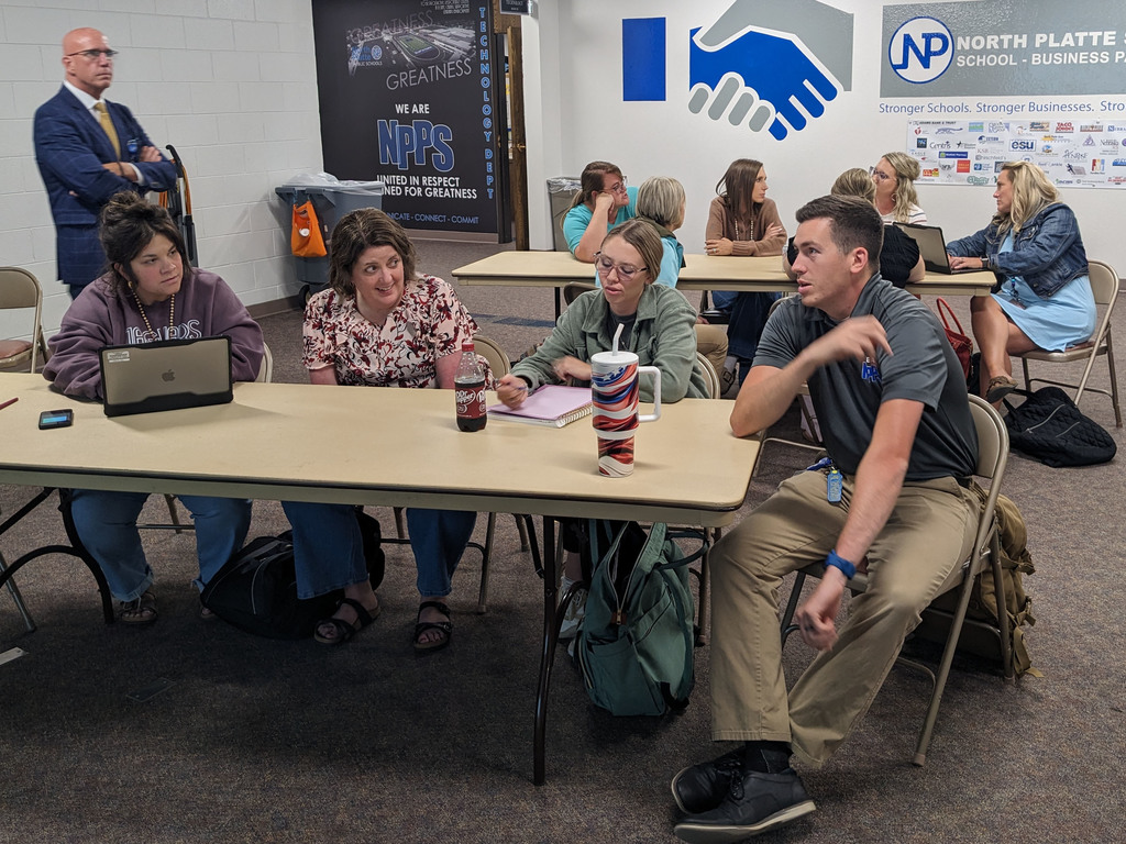 Teachers collaborating during District Guiding Coalition.