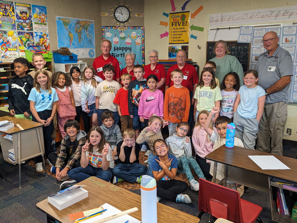 Elks delivering dictionaries at Eisenhower Elementary