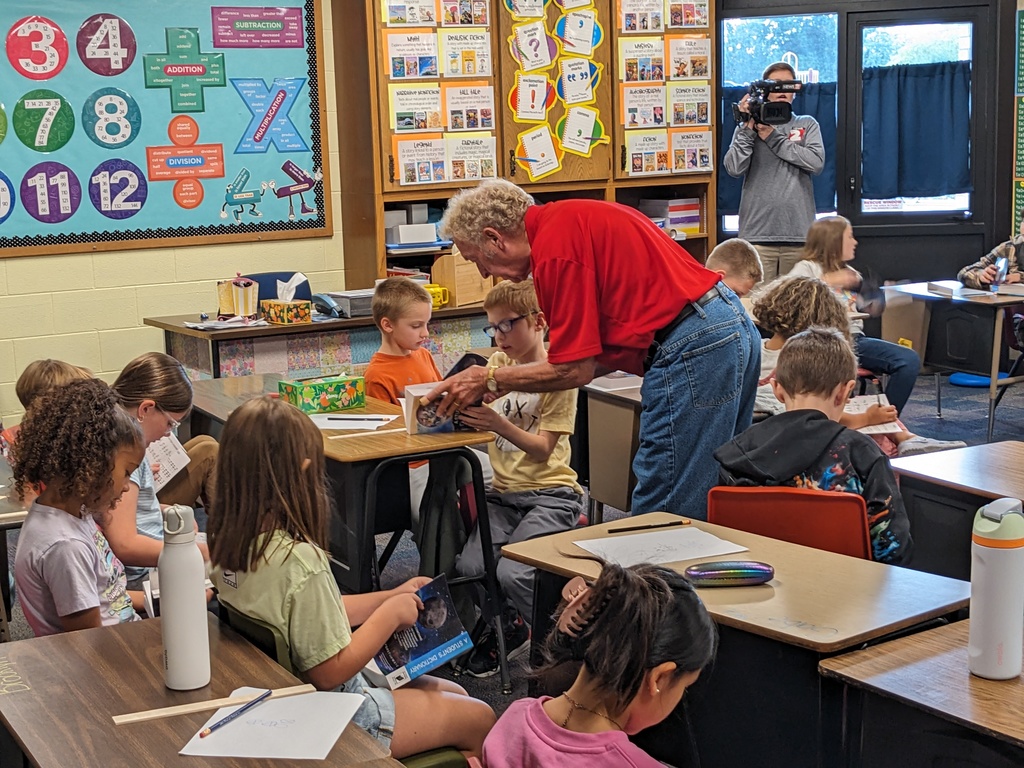 Elks delivering dictionaries at Eisenhower Elementary