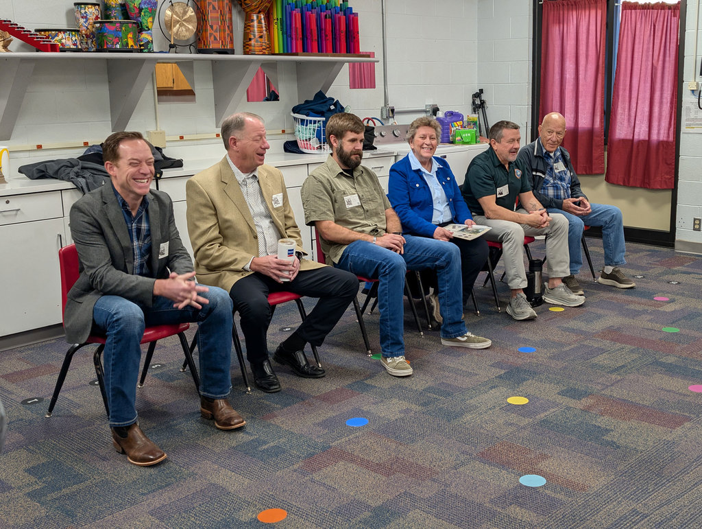 Chris Bruns, Pete Volz, Phil Parrish, Lori Evans, Mark Cullinan, and Loren Babcock visiting Lincoln Elementary about their experiences from serving our country.