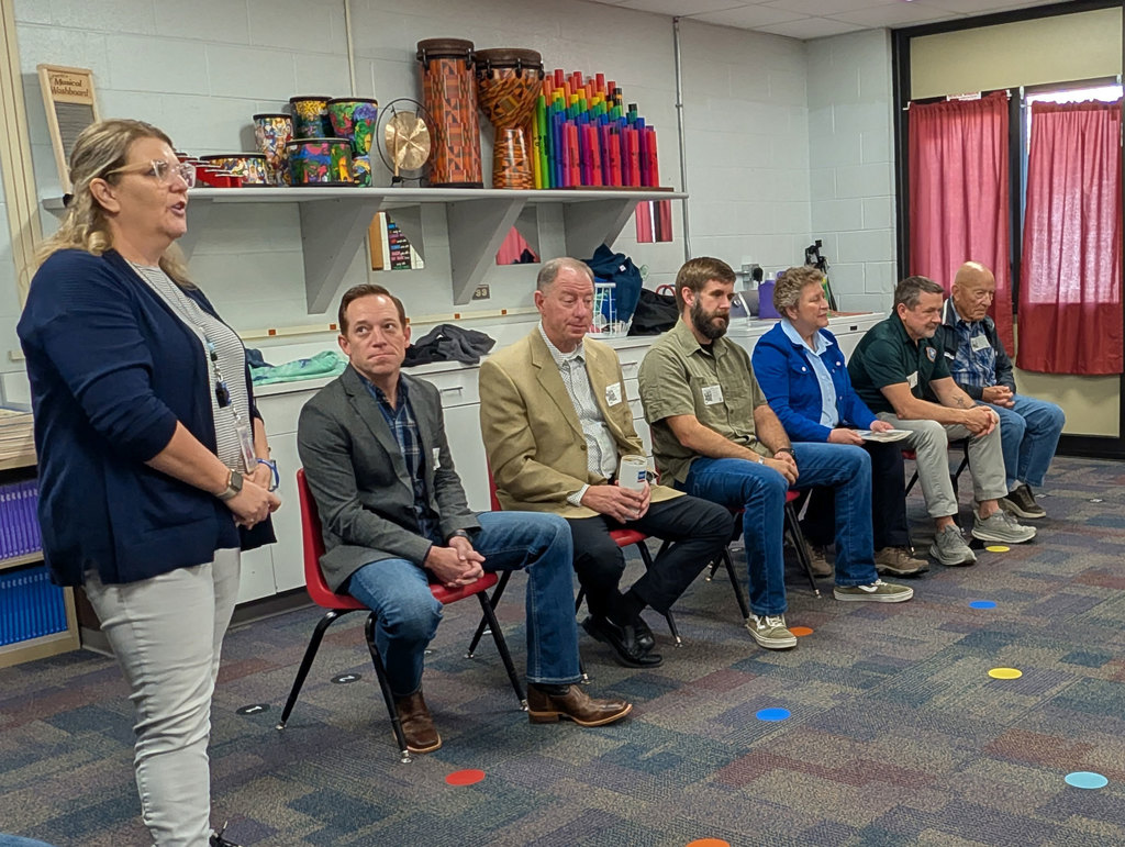 Jannette Kammerer asking veterans from our community questions about their experience in the military.