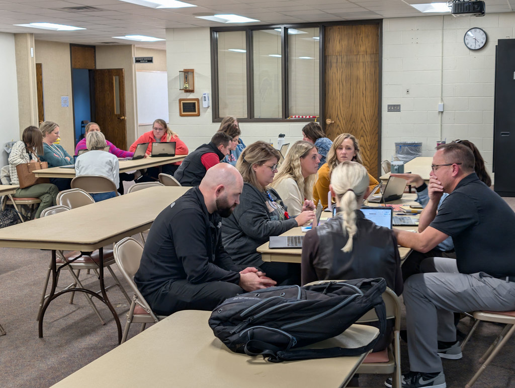 NPPS Guiding Coalition collaborating in small groups.