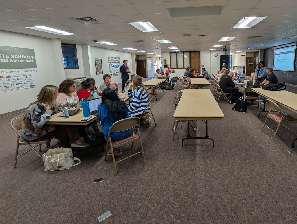 NPPS Guiding Coalition collaborating in small groups.