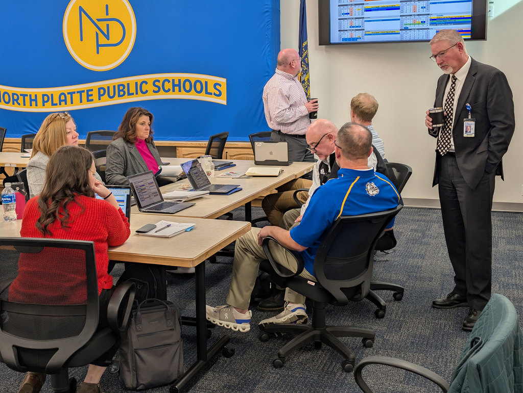 District AdCo Secondary team working on calendar.