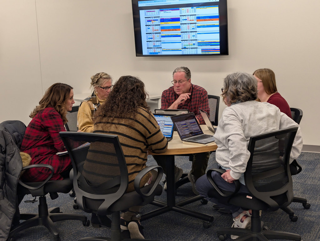 District AdCo Elementary team working on calendar.