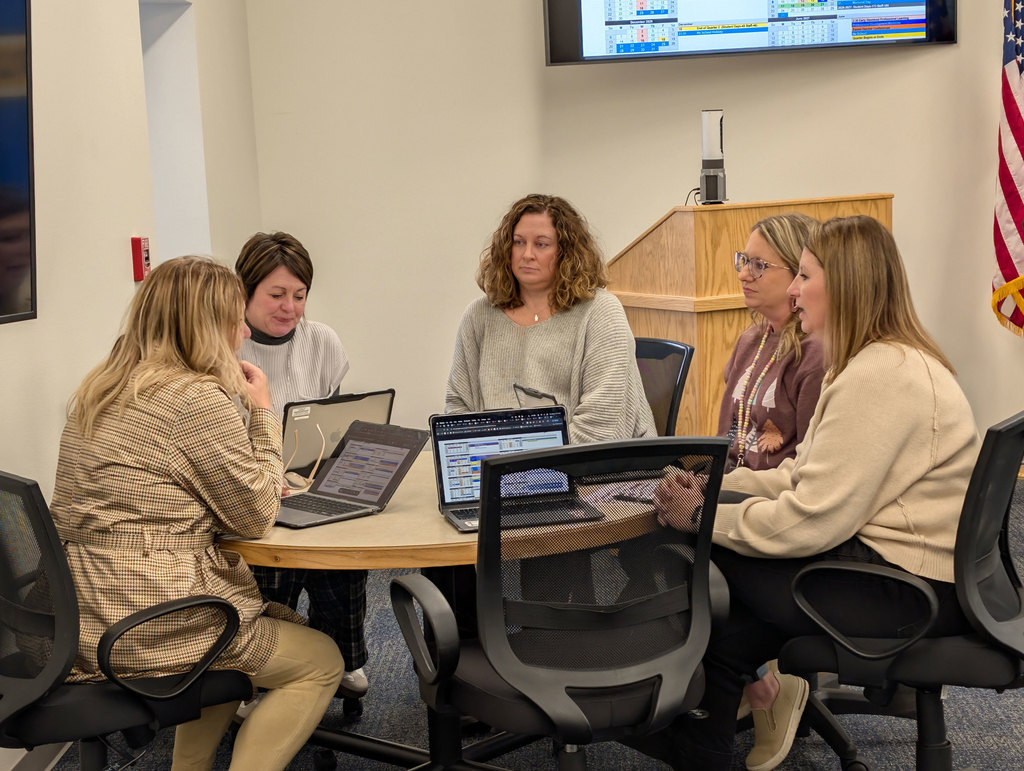 District AdCo Elementary team working on calendar.