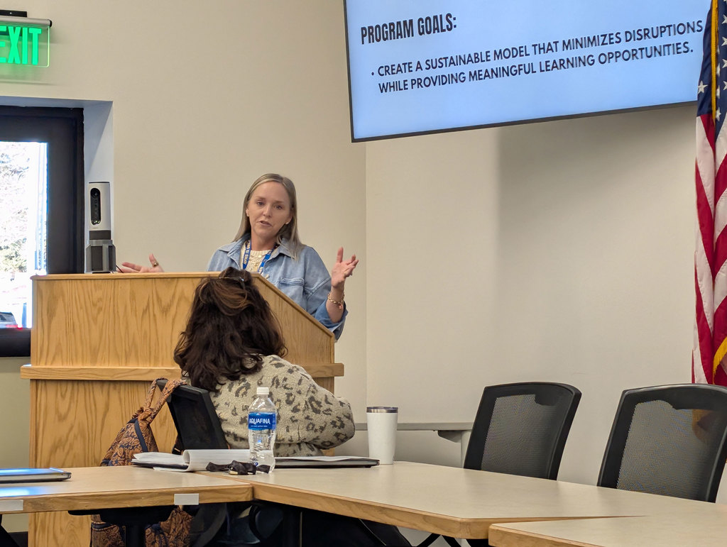 Mrs. Foster presenting to district AdCo