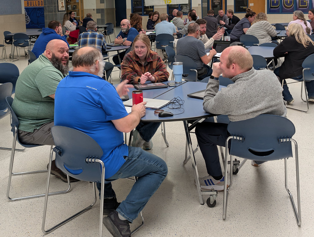 PD day NPHS teachers discussing PLC work.