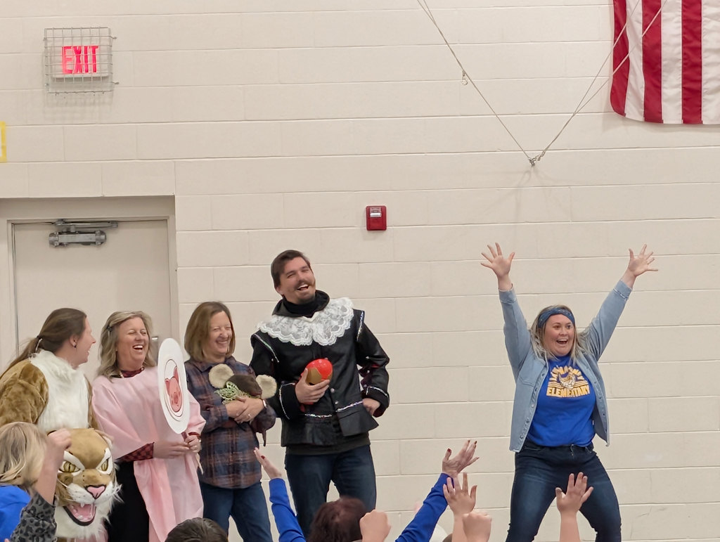 Lake Maloney Elementary Staff cheering.