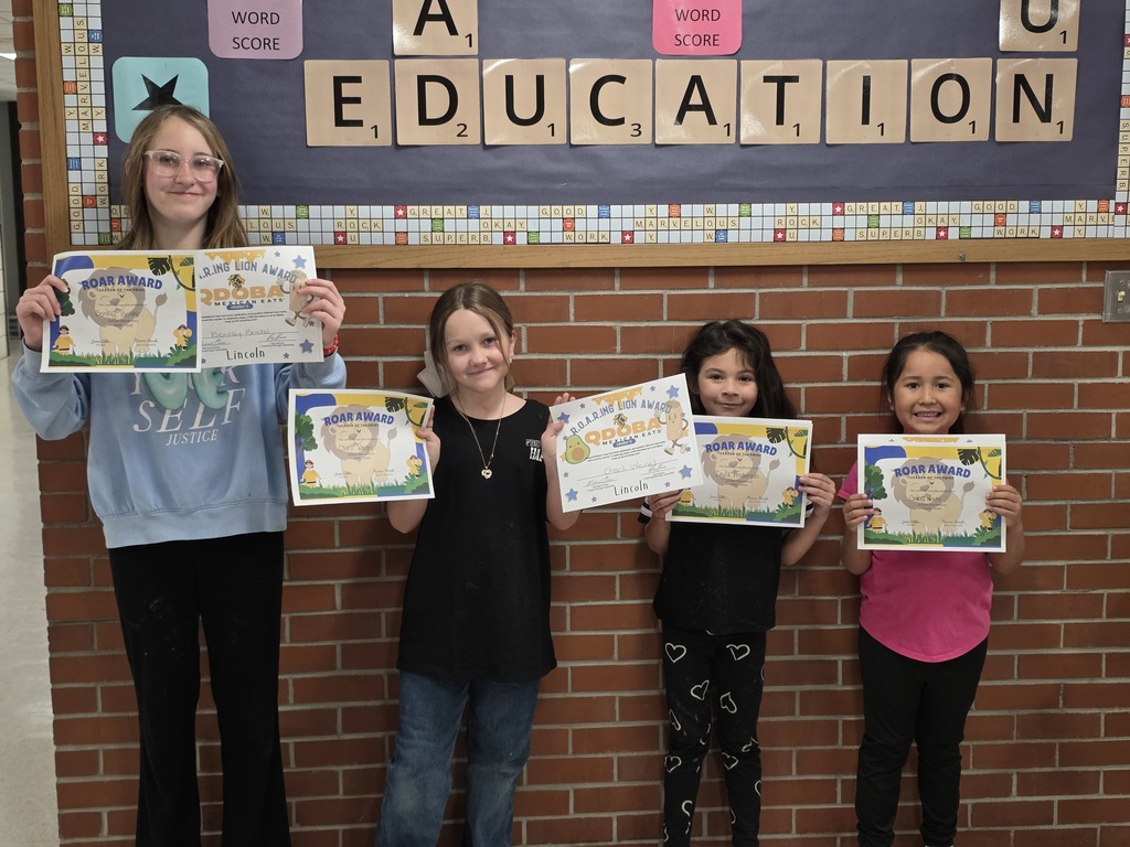 Four students with awards