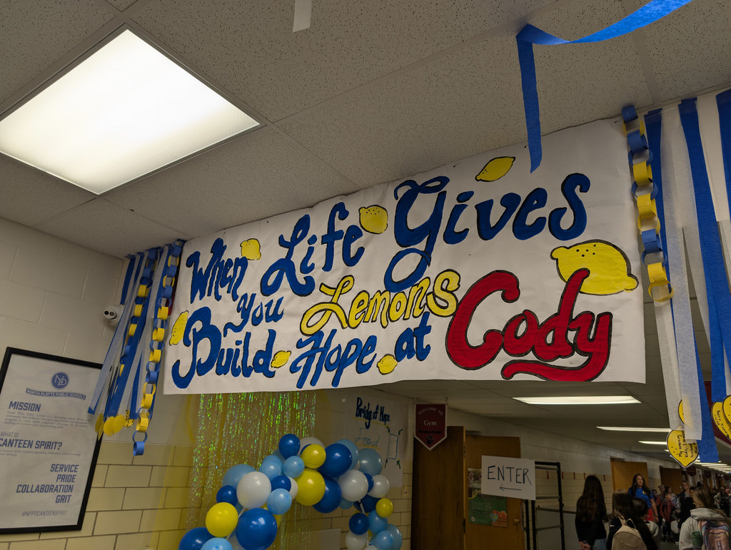 A painted sign in Cody Elementary that reads: When life gives you lemons, build hope at Cody.