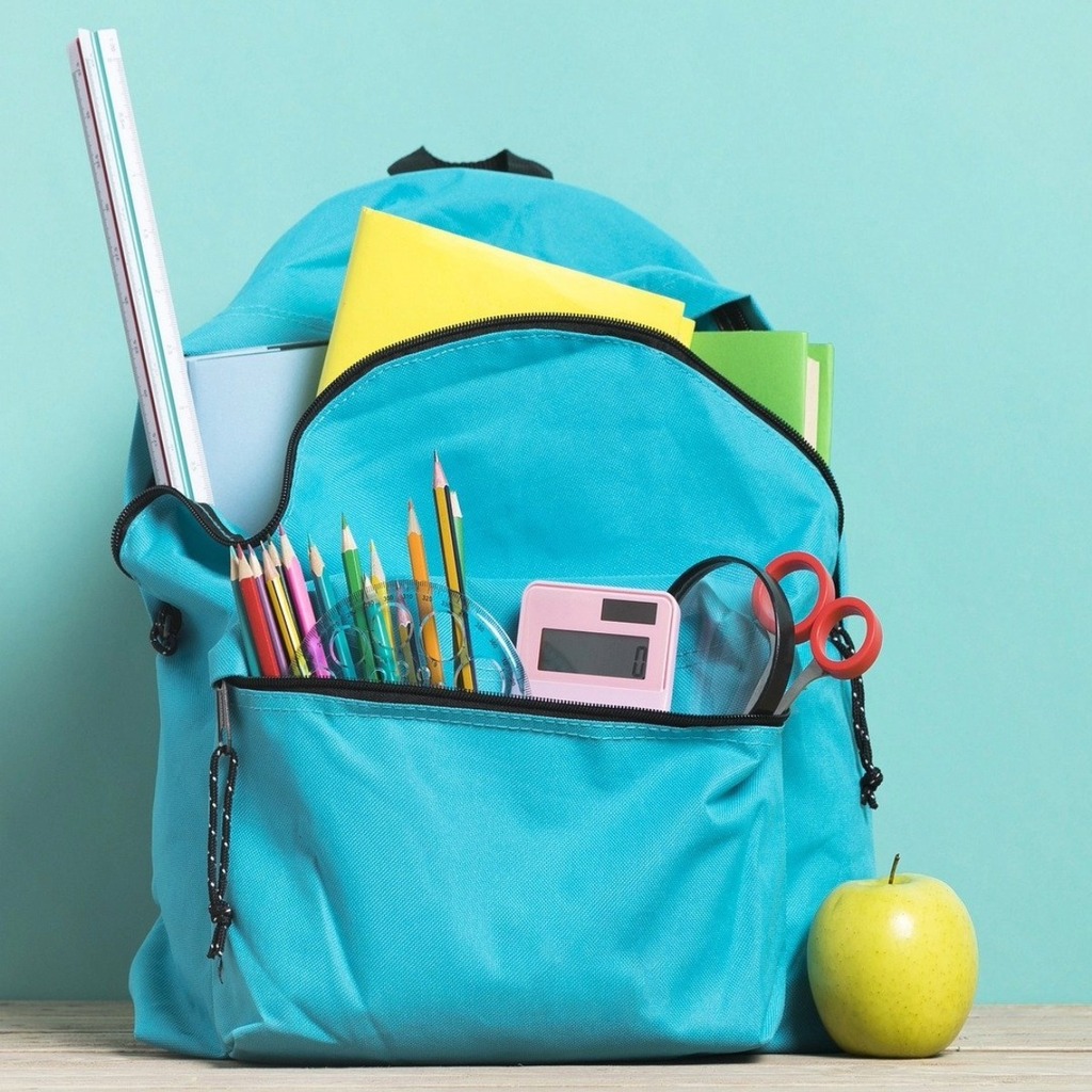 Blue backpack with school supplies