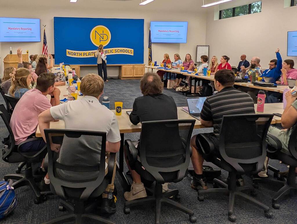 NPPS Foundation visiting with new staff.