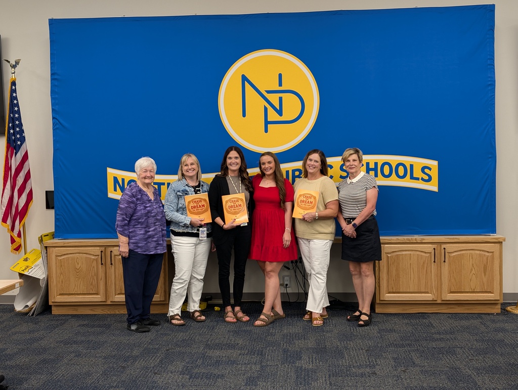NPPS Media Specialists being presented with books from Calie Troyer and North Platte's PEO chapter.