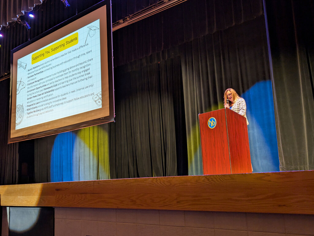 NPPS Foundation Director Terri Burchell presenting to staff.