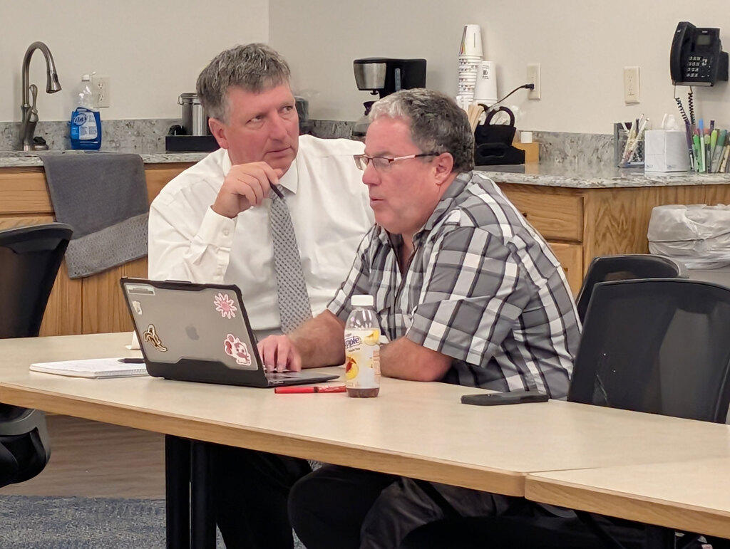 Elementary administrators working in PLC.