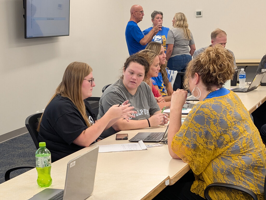 Elementary administrators working in PLC.