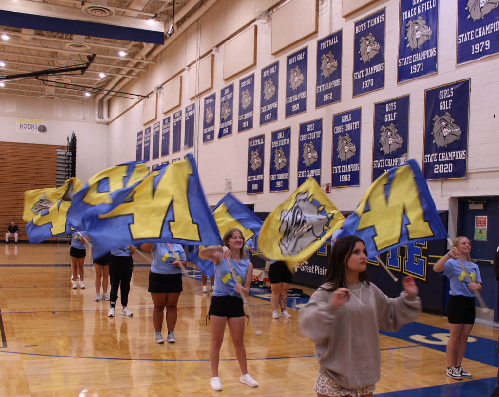 Color Guard performs with the band at pep rally