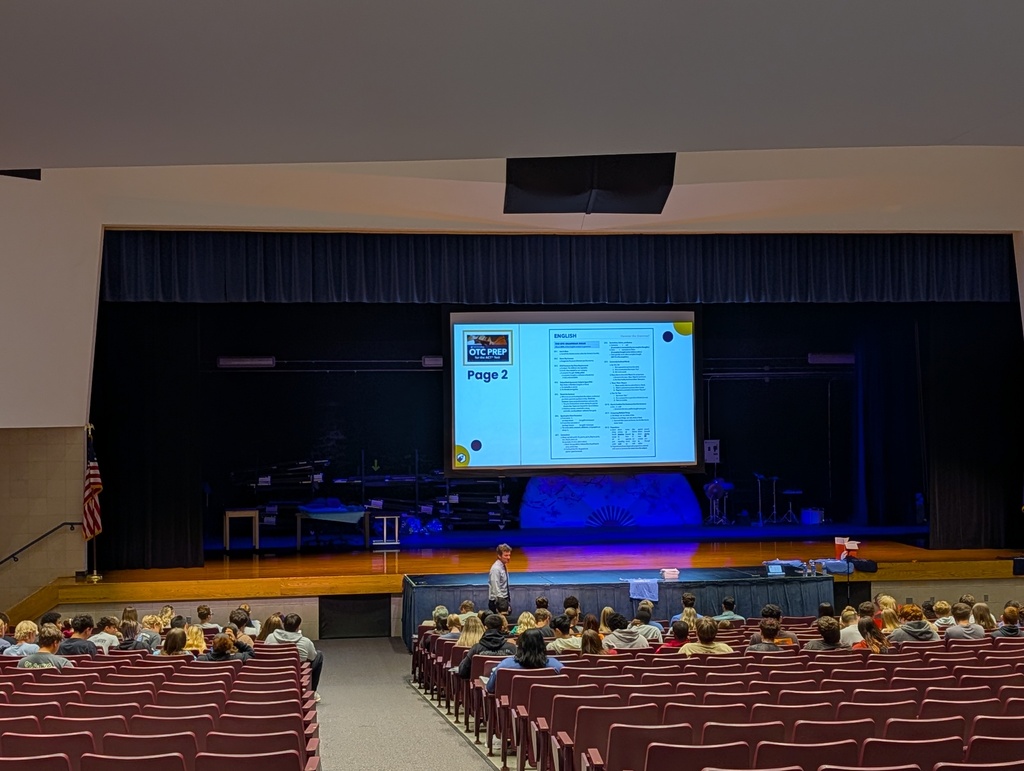 John Baylor addressing students in the PAC.