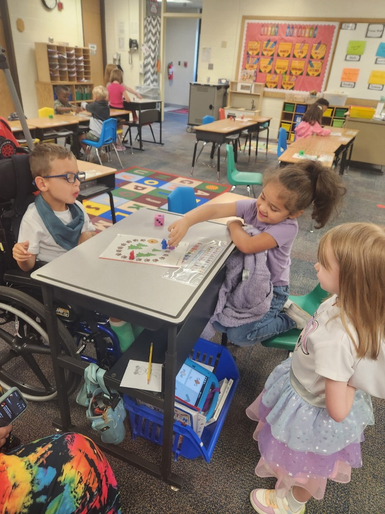 kindergartners practicing counting two