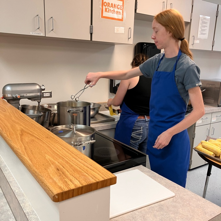 Students prepare food in Culinary II