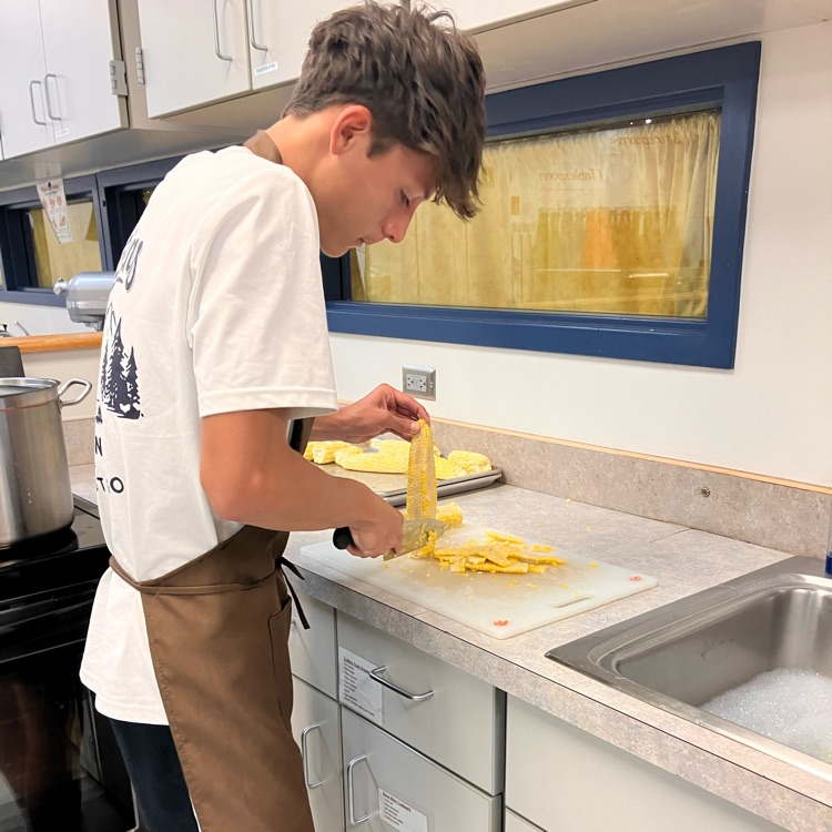 Students prepare food in Culinary II