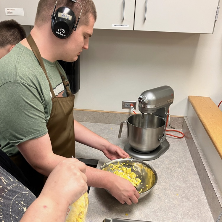 Students prepare food in Culinary II