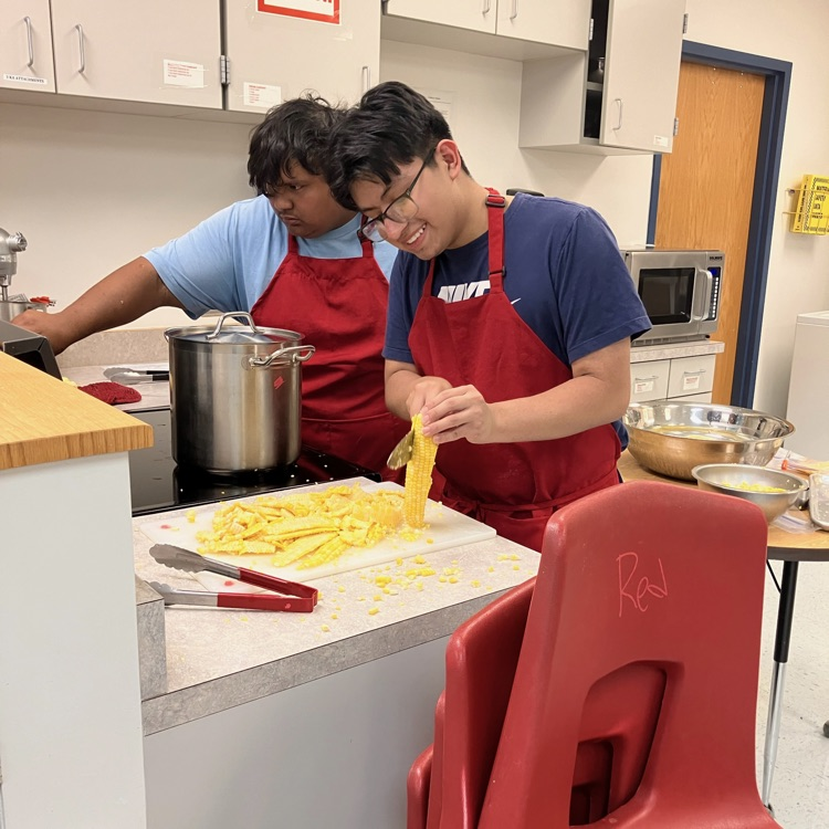 Students prepare food in Culinary II