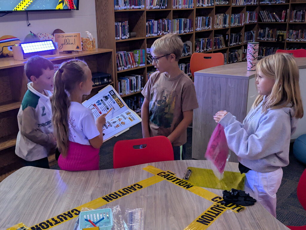 Students looking at directions for class activity.