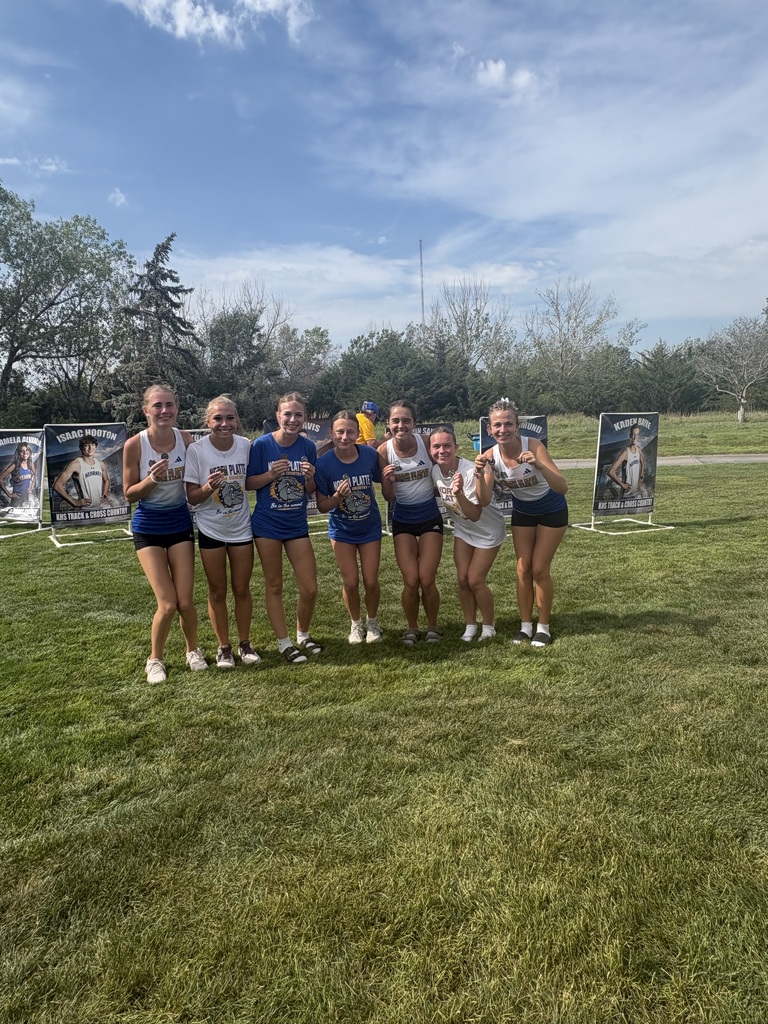 Girls Cross Country Team Photo with Medals