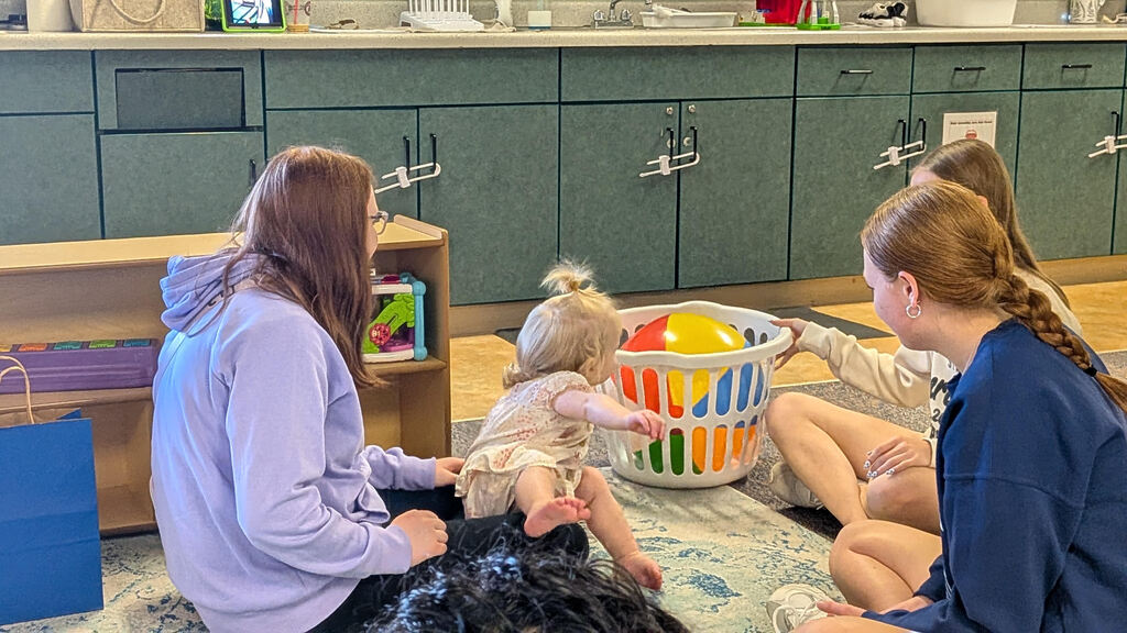 Students interact with toddlers for Best Practices in Early Childhood
