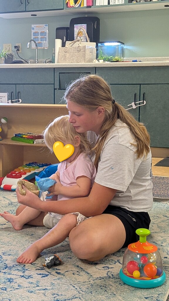 Students interact with toddlers for Best Practices in Early Childhood