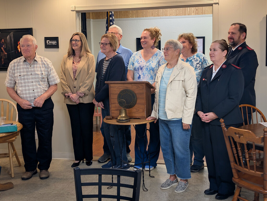 Kiwanis presenting donations to local food pantry.