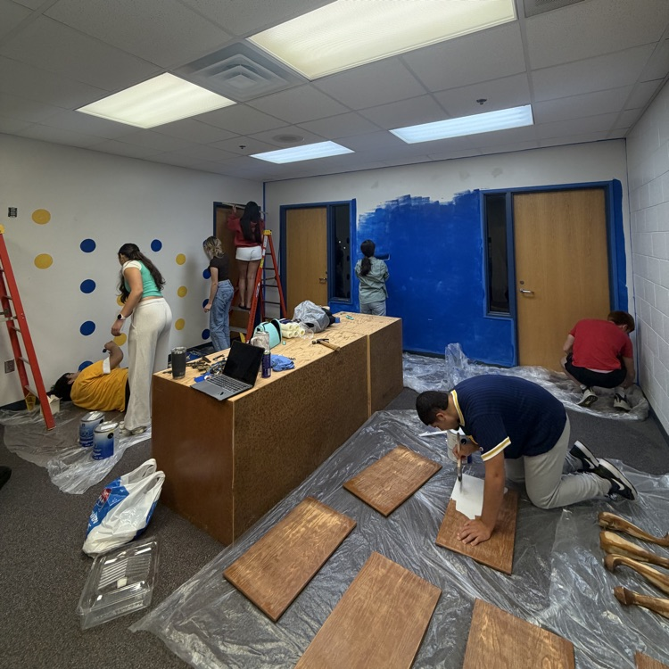 students painting Paws and Power
