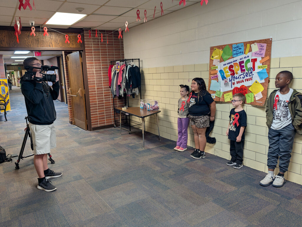 Students visiting with KNOP