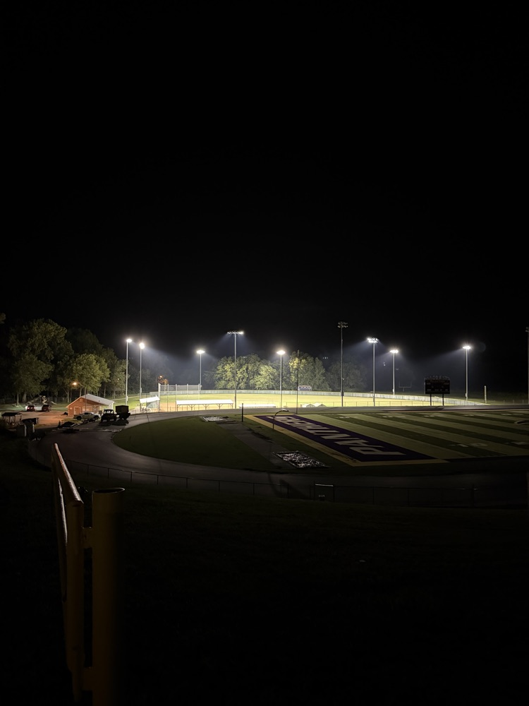 Lightning caused the softball field to be empty.