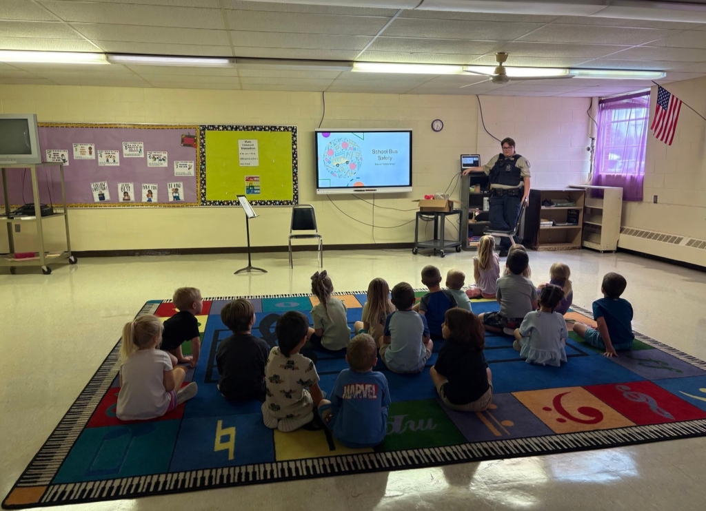 Deputy Kroge presented a lesson over bus safety to all the students at NPE.