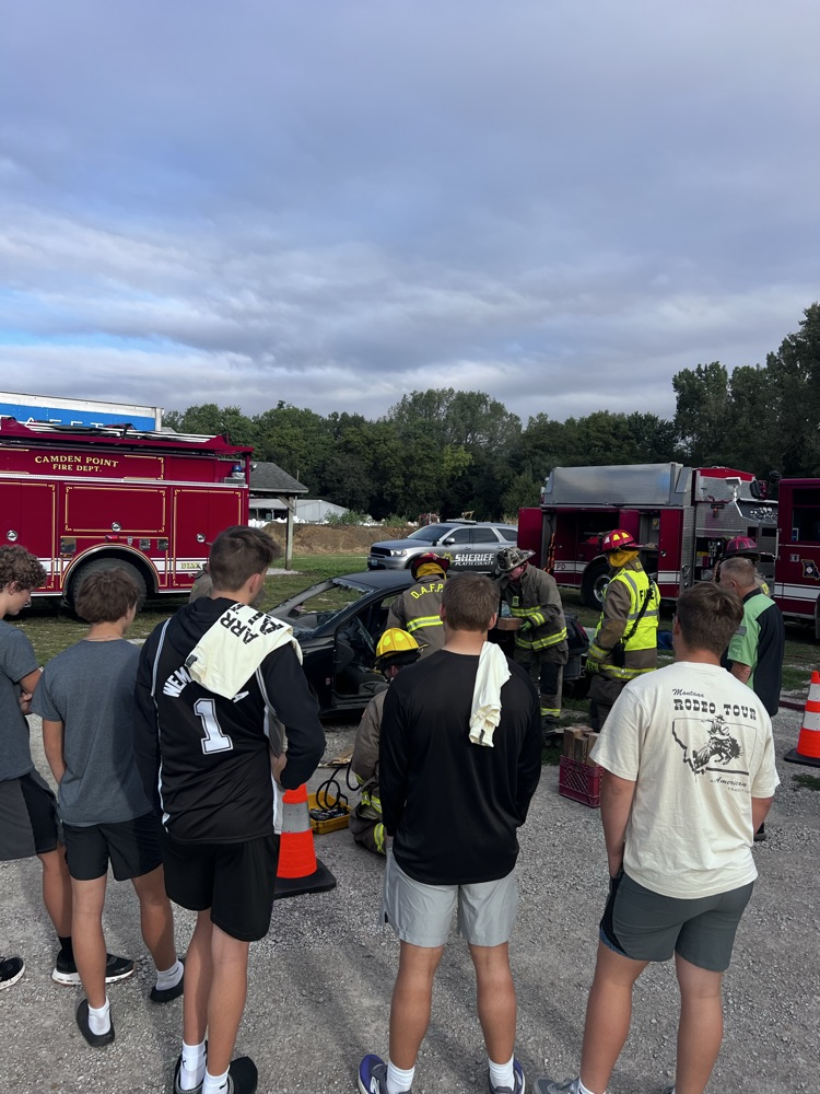 students watch an vehicle extrication demonstration 