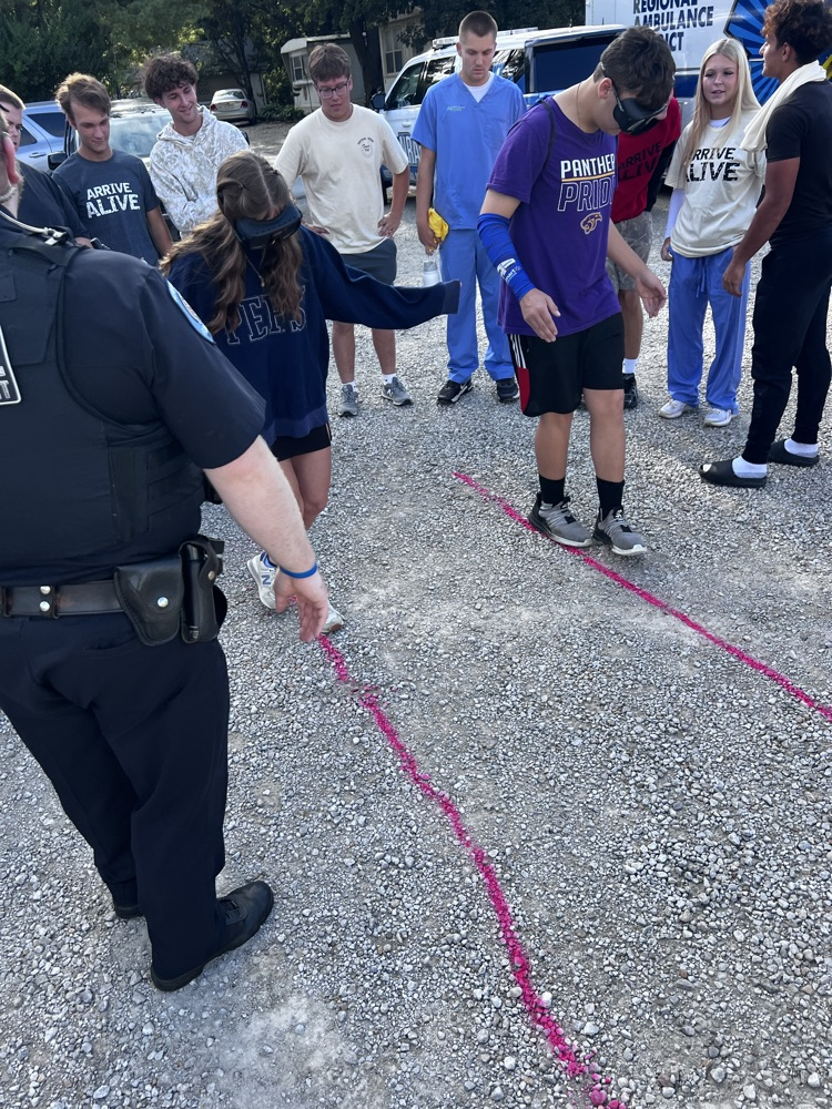 students try to do a field sobriety test