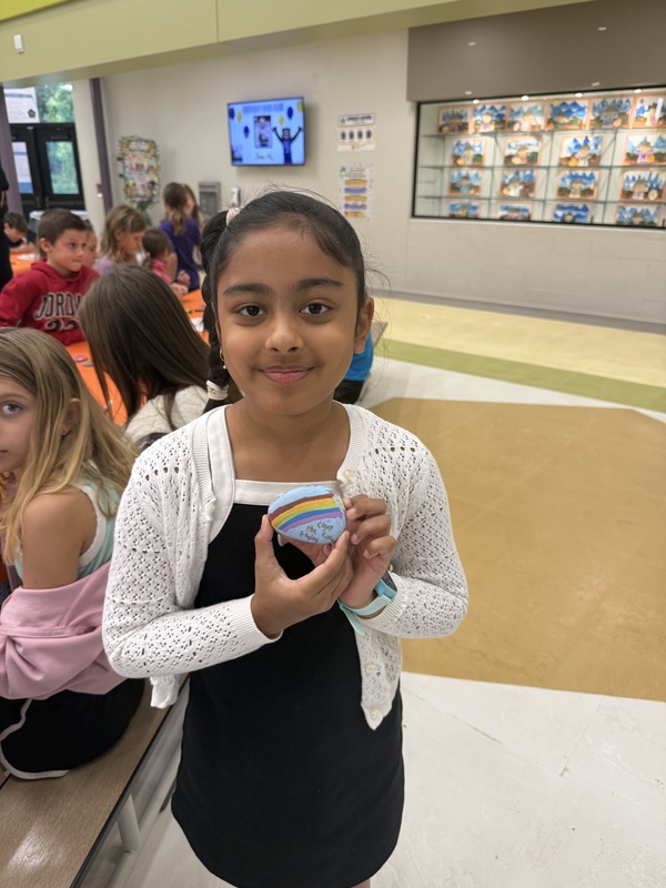 students painting rocks
