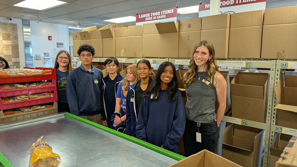Students preparing food boxes