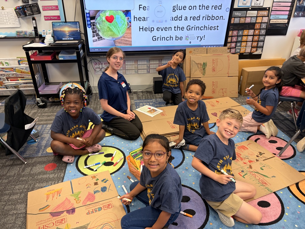 6 students decorating boxes forfood bank