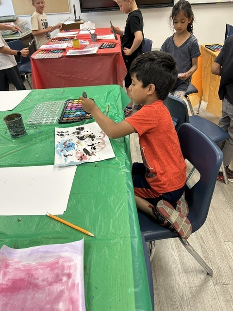 students painting