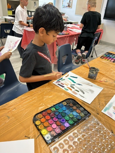 Student exploring with colors