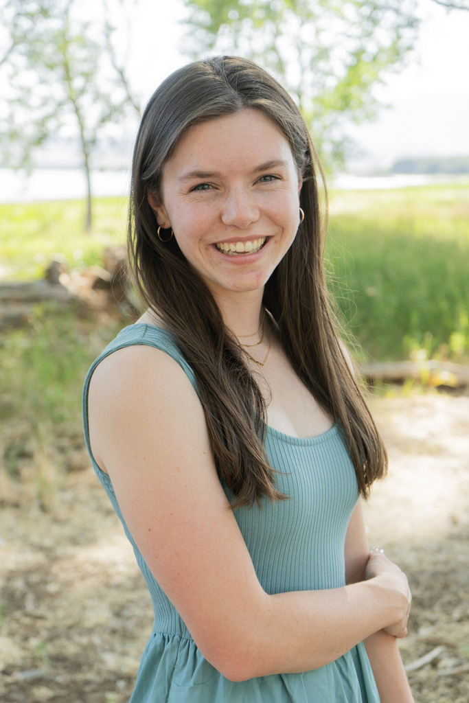 female in park smiling