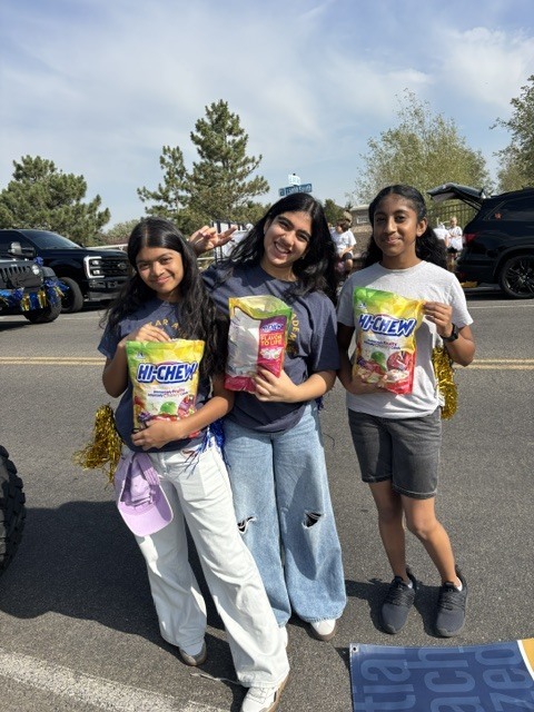 3 middle school students at parade