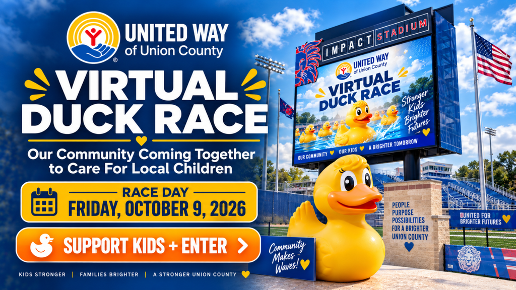 Advertisement for Virtual Duck Race. A large digital sign displays a virtual duck race. A large rubber duck sits on a pedestal.